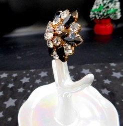 black white brooch side